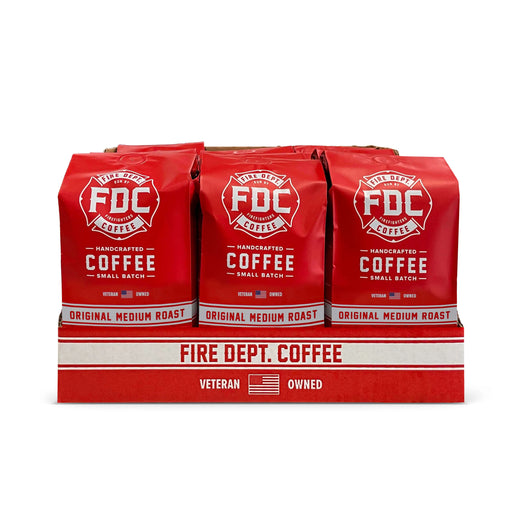 Front view of twelve 12 oz bags of Original Medium Roast in open display box