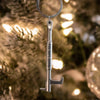 New York Hook Bottle Opener as ornament on a tree