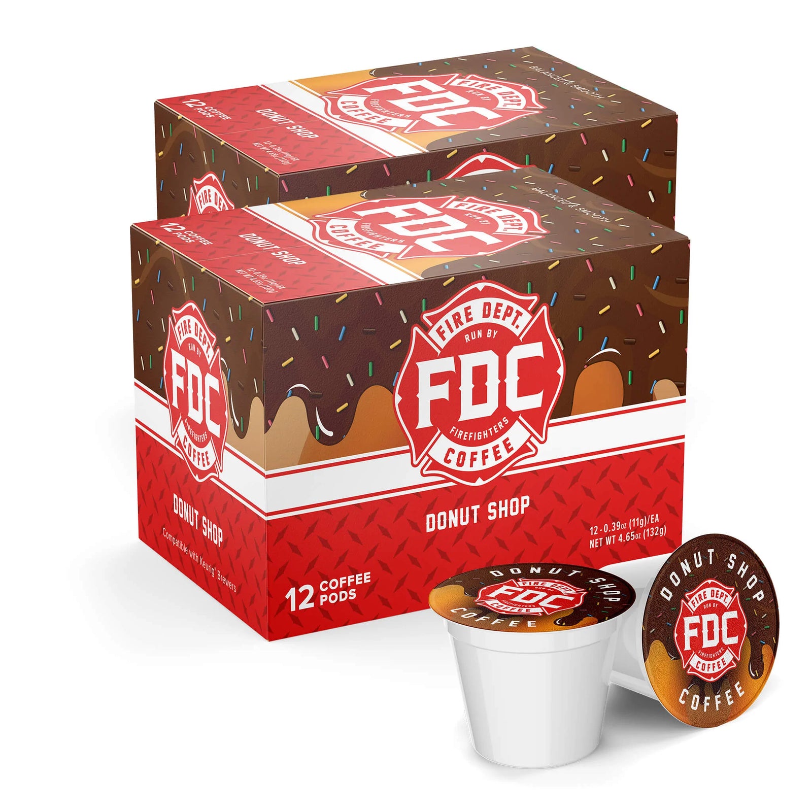 A 12 count box of Fire Department Coffee's Donut Shop Coffee Pods with a fun donut design on the box.