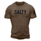 A heathered, espresso color t shirt with the text ”Salty” across the chest in large, black letters. The black FDC maltese cross is on the sleeve.
