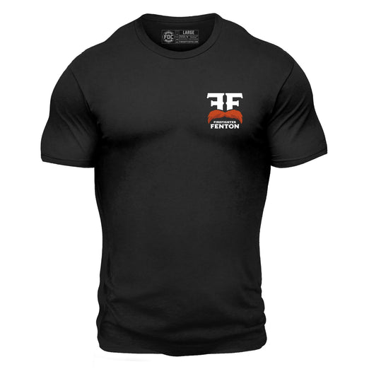 The front of a black shirt with a Firefighter Fenton mustache logo on the chest.