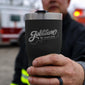 Image of firefighter holding Jobtown 20oz tumbler