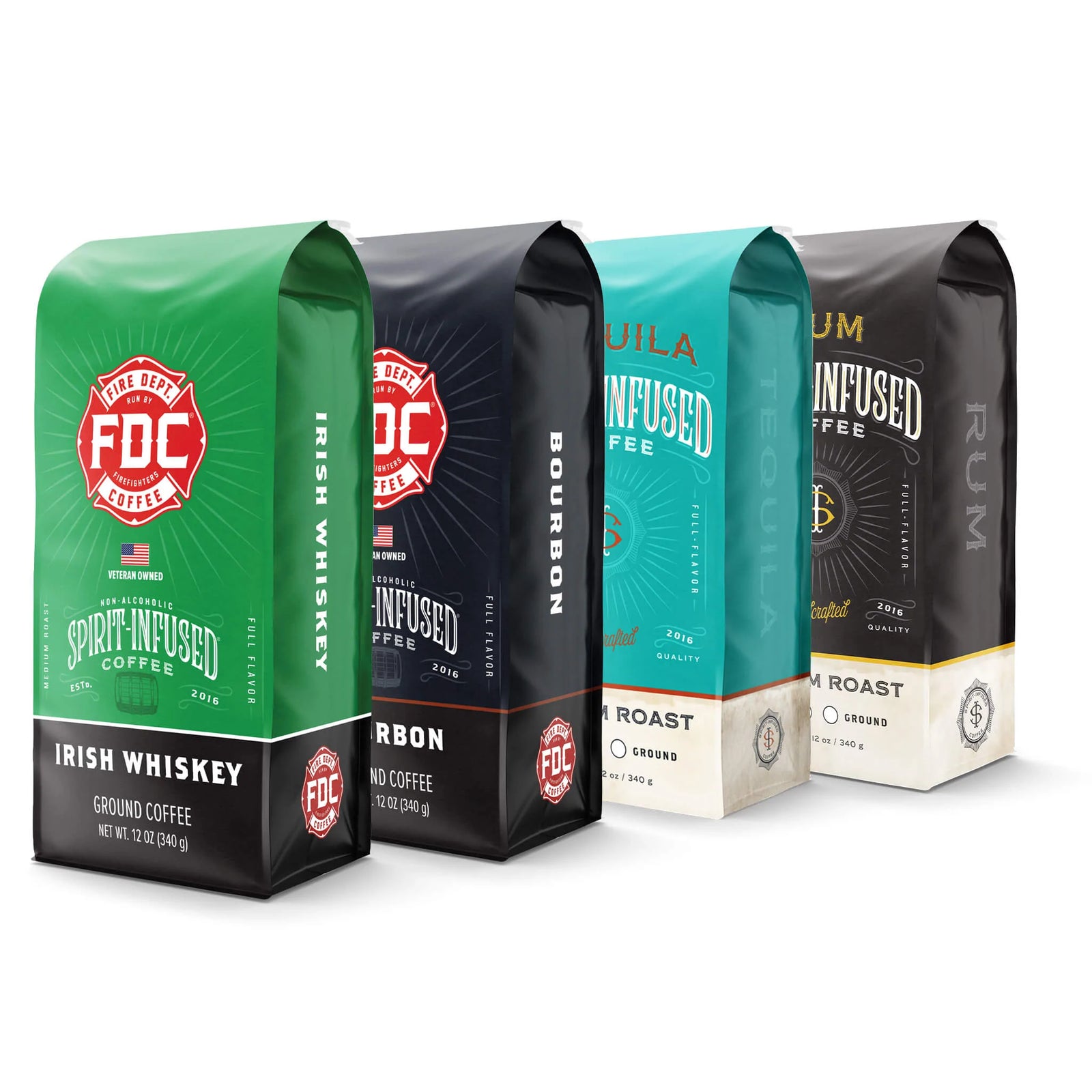 Four bags of Fire Department Coffee's Spirit Infused Coffee. From front to back: Bourbon Infused Coffee bag, Irish Whiskey Infused Coffee bag, Tequila Infused Coffee bag, and Rum Infused Coffee bag.